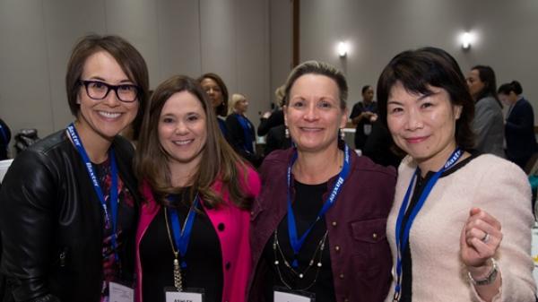 Thumbnail of female employees posing for international women's day